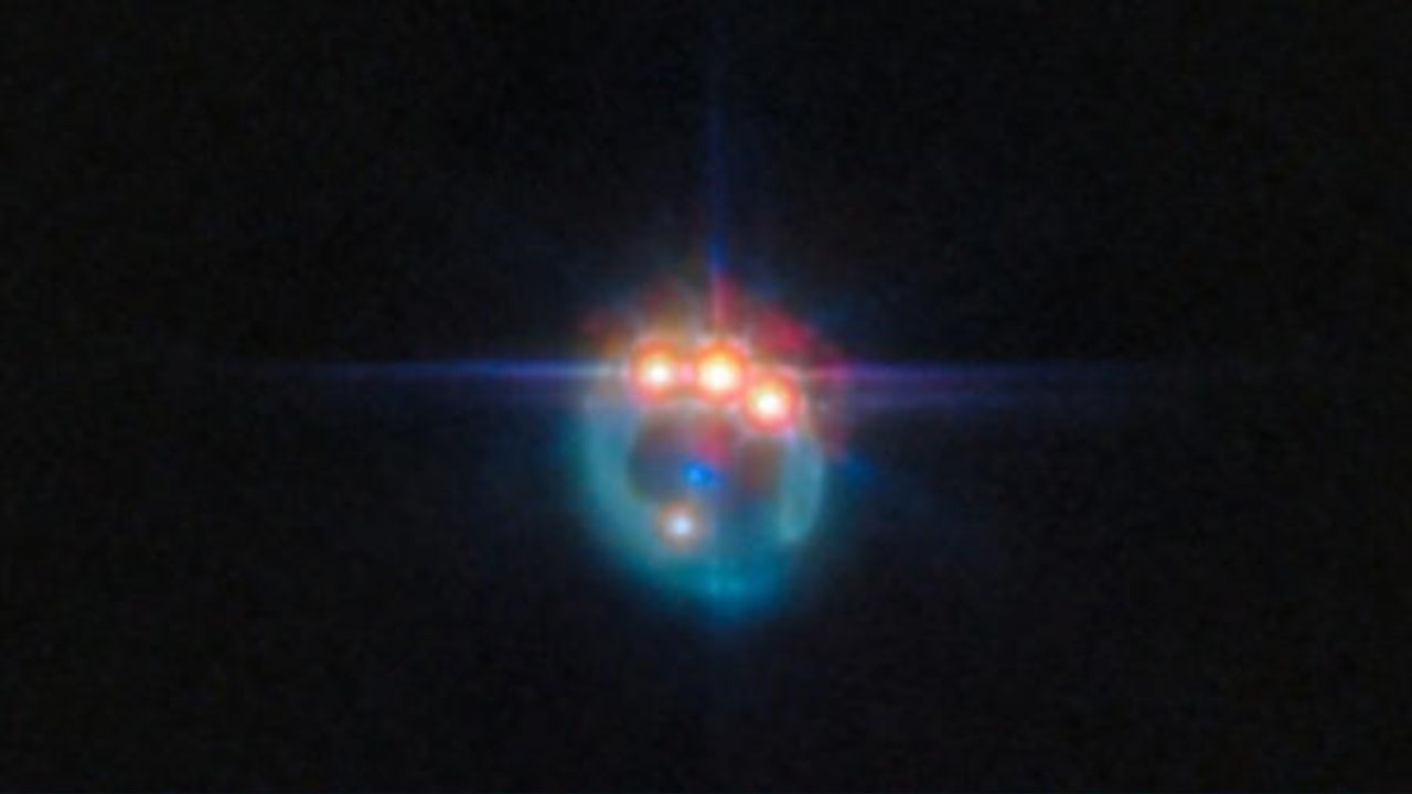 NASA's James Webb Telescope Captures Stunning Bejeweled Einstein Ring Around Distant Quasar